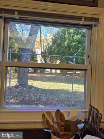 a view of a living room and window