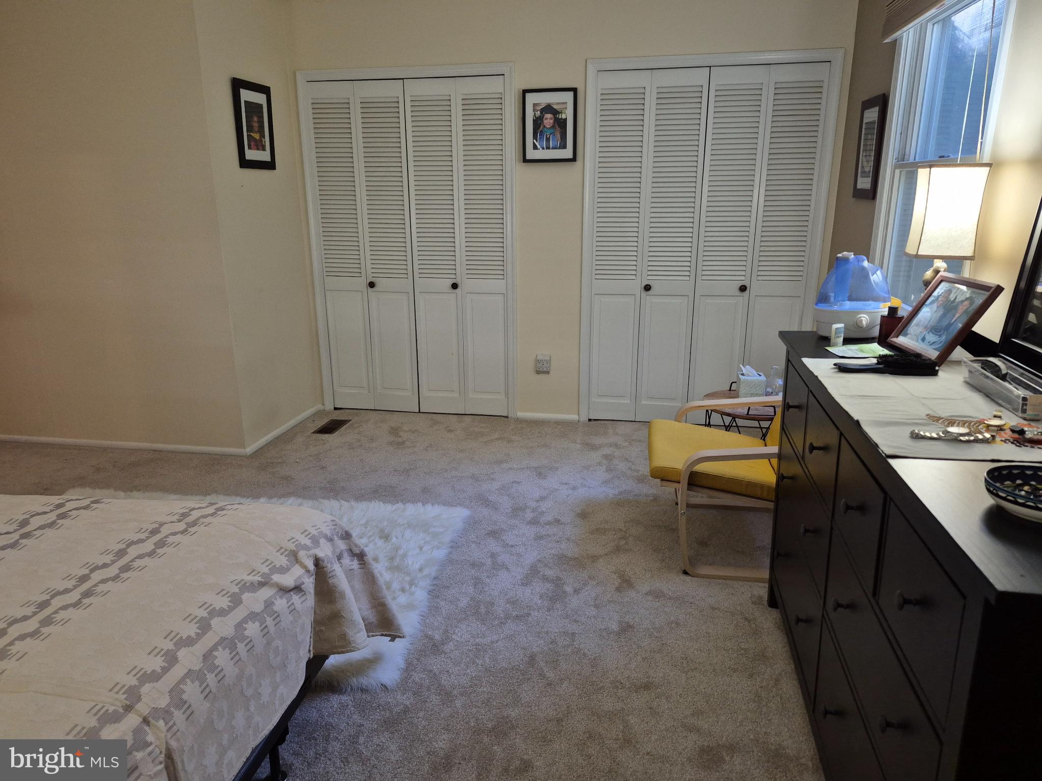 12512 Ofallon Street Silver Spring, MD 20904 - Photo 21 of 44 a bedroom with a bed and a desk