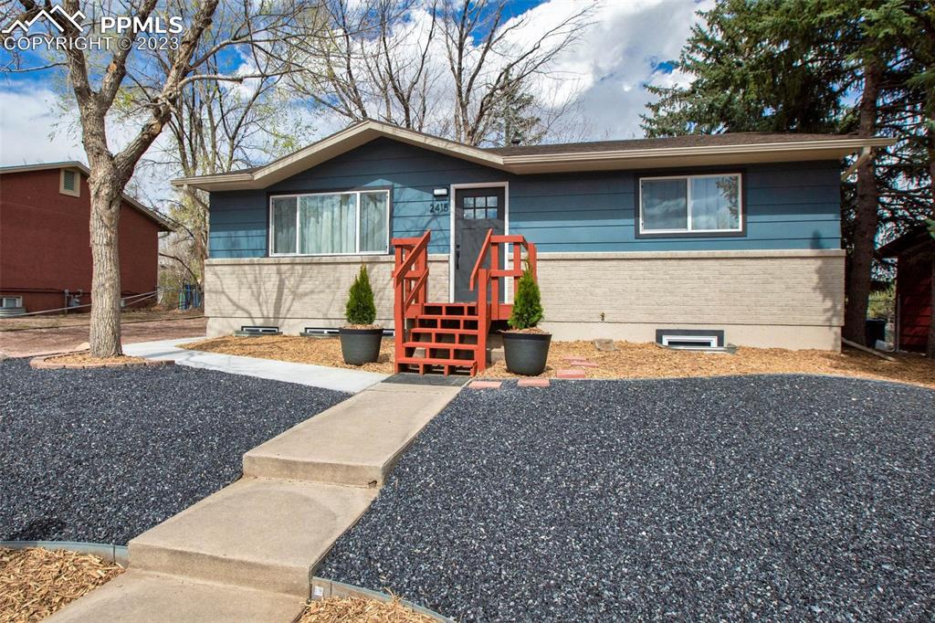 2415 Monterey Road Colorado Springs, CO 80910 - Photo 2 of 36 a view of outdoor space yard and front view of a house