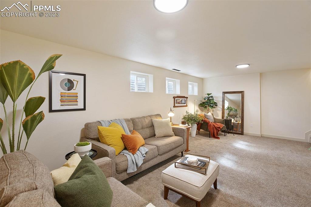 2415 Monterey Road Colorado Springs, CO 80910 - Photo 23 of 36 a living room with furniture and a couch