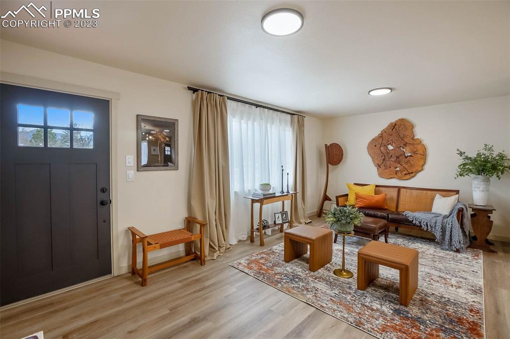 2415 Monterey Road Colorado Springs, CO 80910 - Photo 3 of 36 a living room with furniture and a window