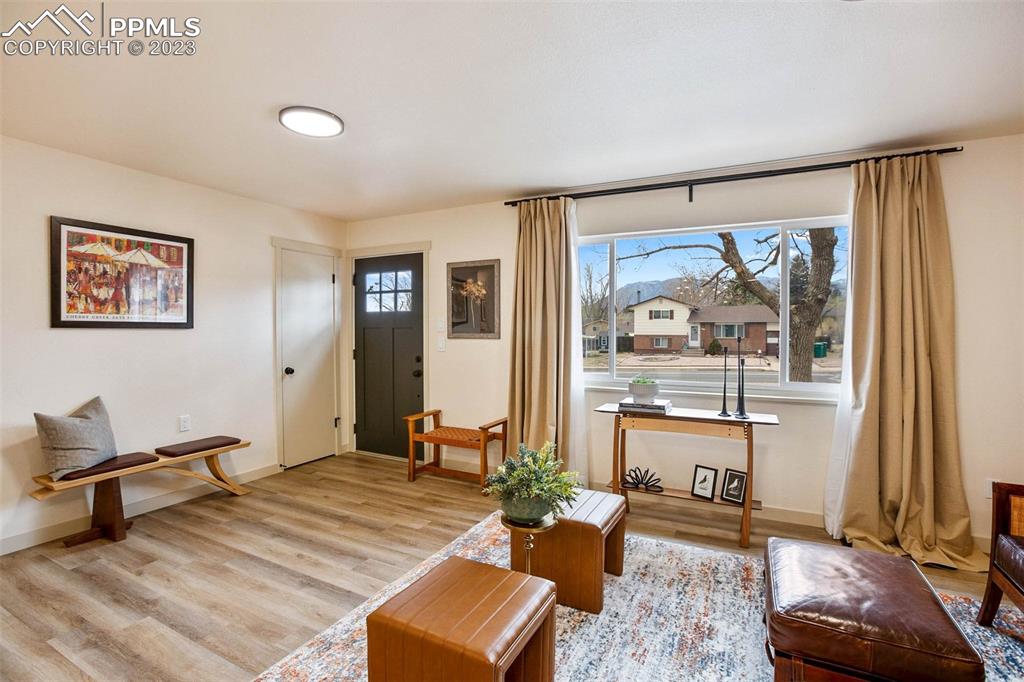 2415 Monterey Road Colorado Springs, CO 80910 - Photo 5 of 36 a living room with furniture and a window