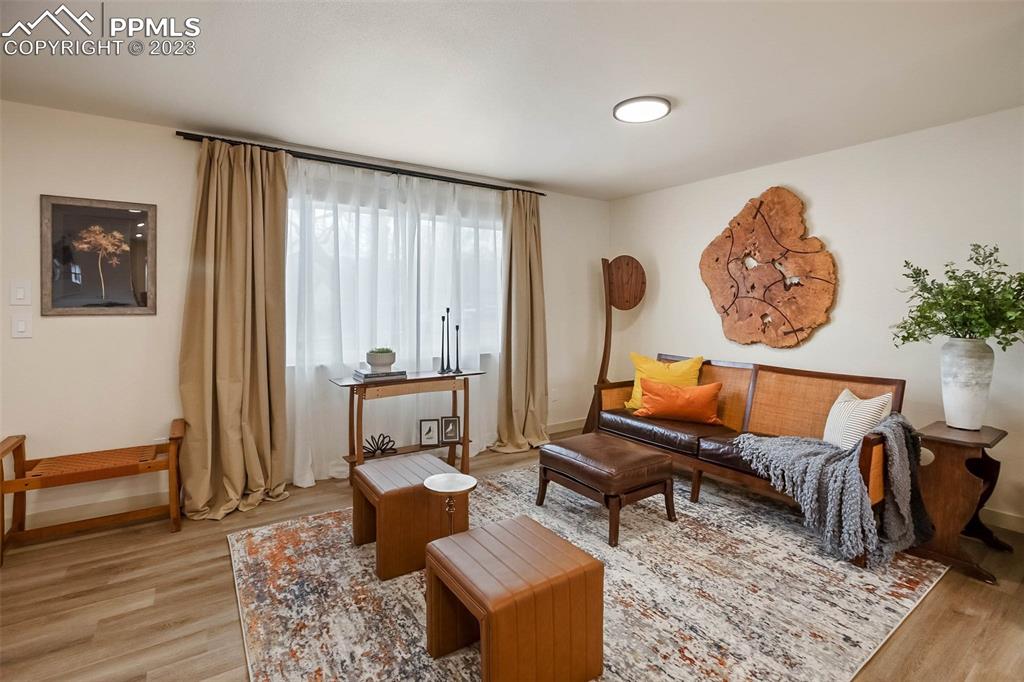 2415 Monterey Road Colorado Springs, CO 80910 - Photo 6 of 36 a living room with furniture and a window