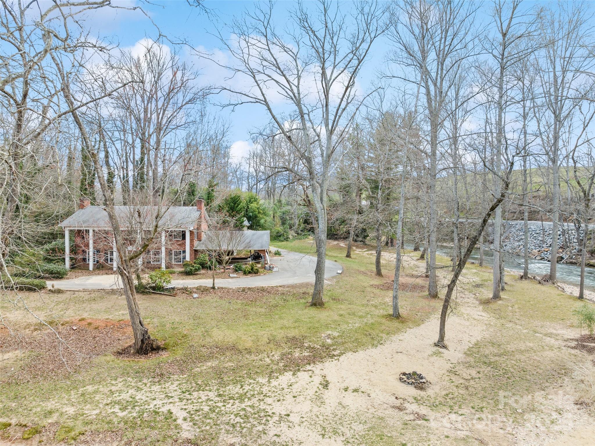 21 Riverbend Street Canton, NC 28716 - Photo 13 of 47 a view of a yard with a tree
