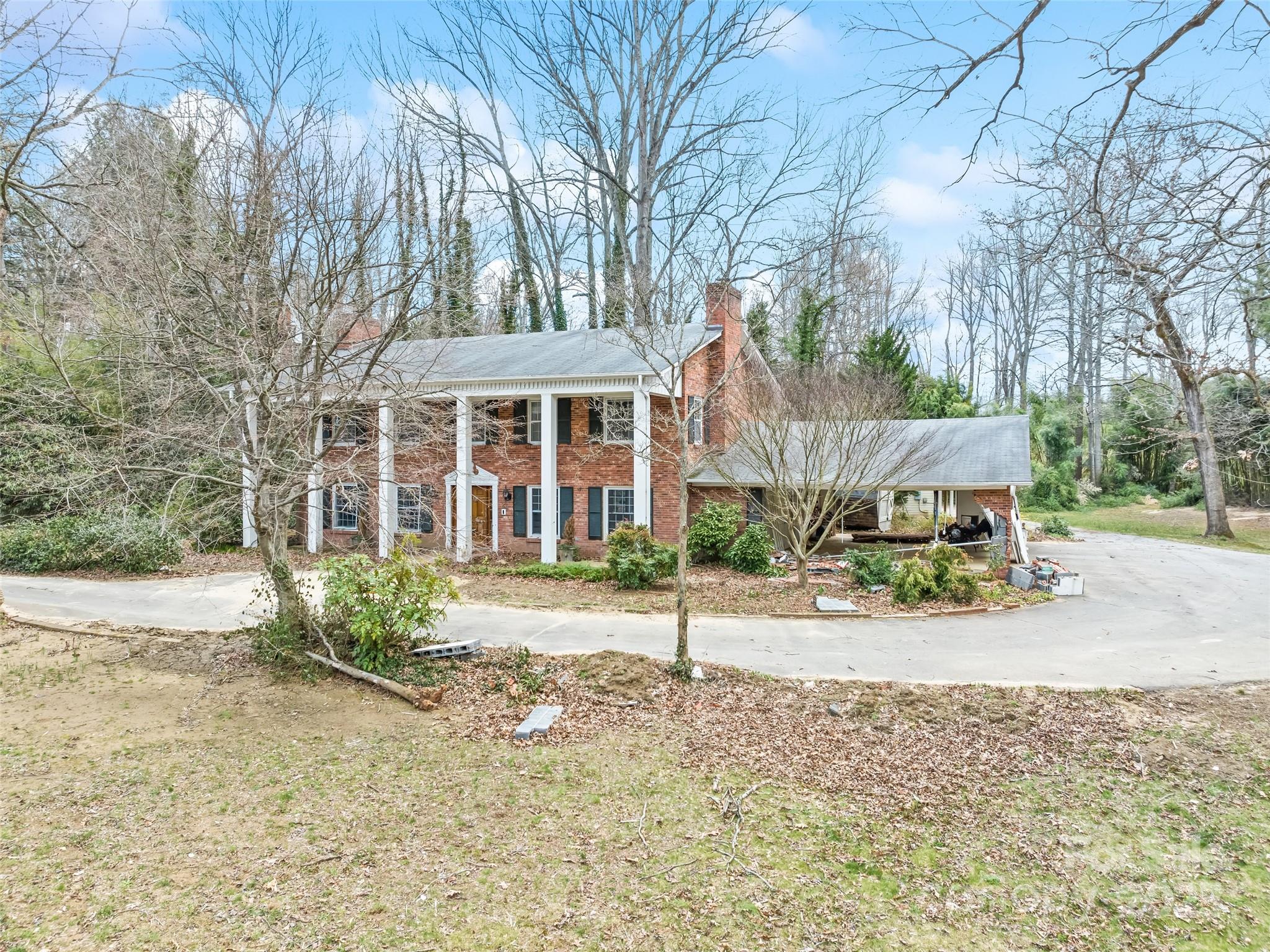 21 Riverbend Street Canton, NC 28716 - Photo 14 of 47 a view of a house with a yard and large tree