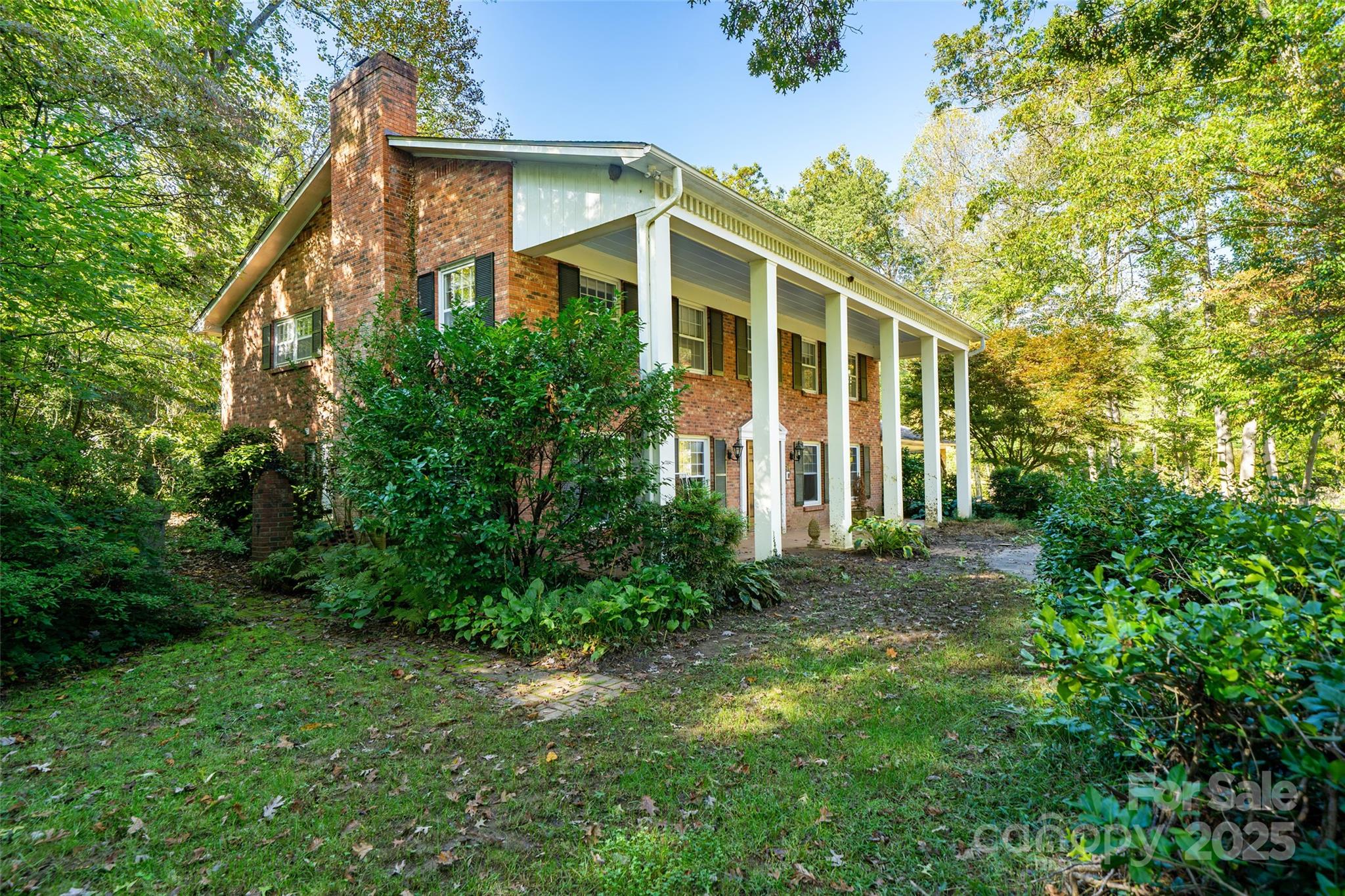 21 Riverbend Street Canton, NC 28716 - Photo 2 of 47 front view of a house with a yard