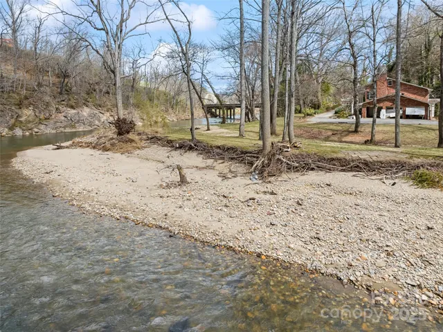 a view of a dirt road from a big room