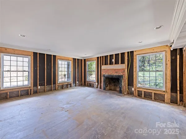 an empty room with furniture and closet