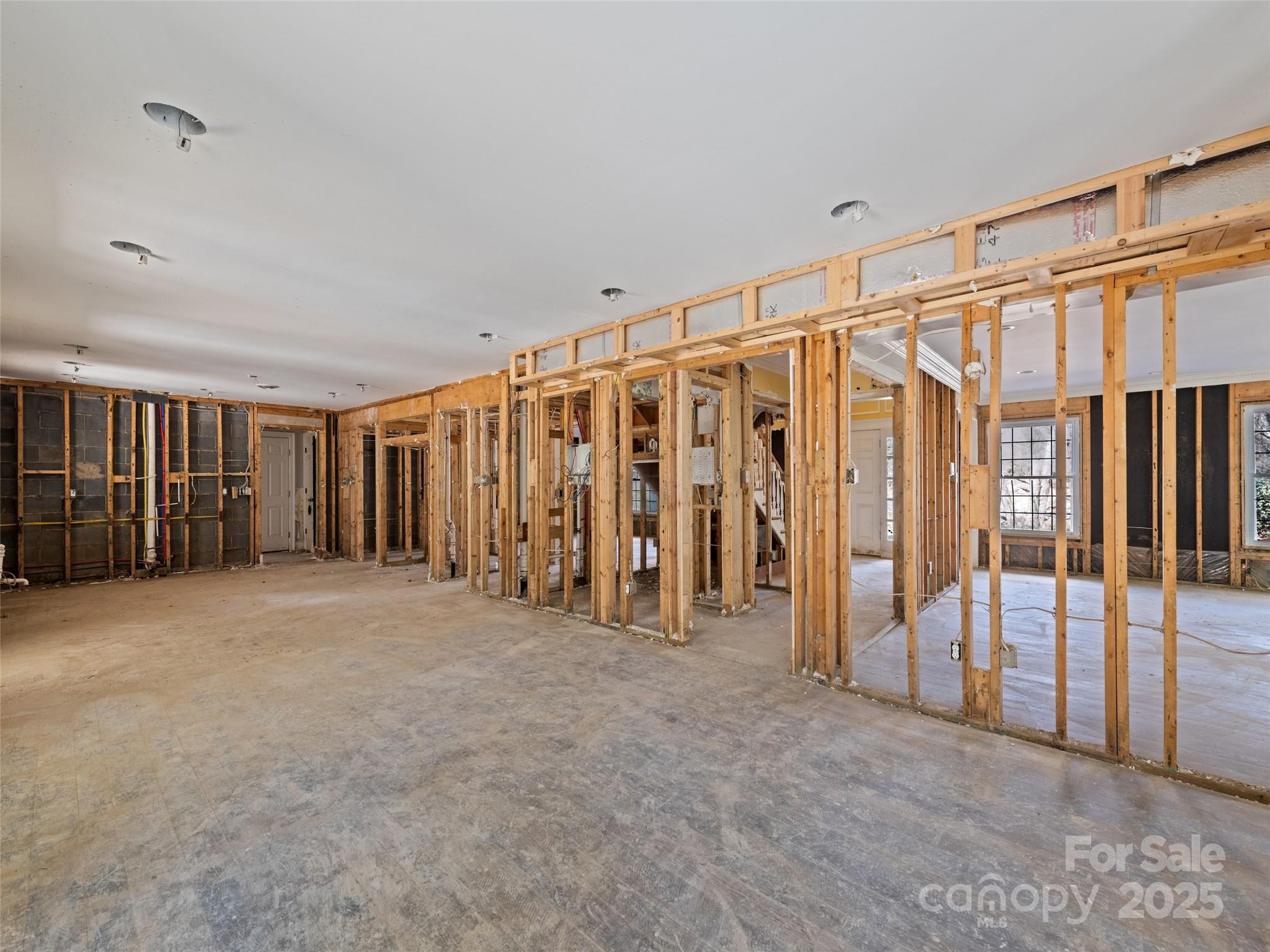 21 Riverbend Street Canton, NC 28716 - Photo 27 of 47 a view of an empty room with staircase