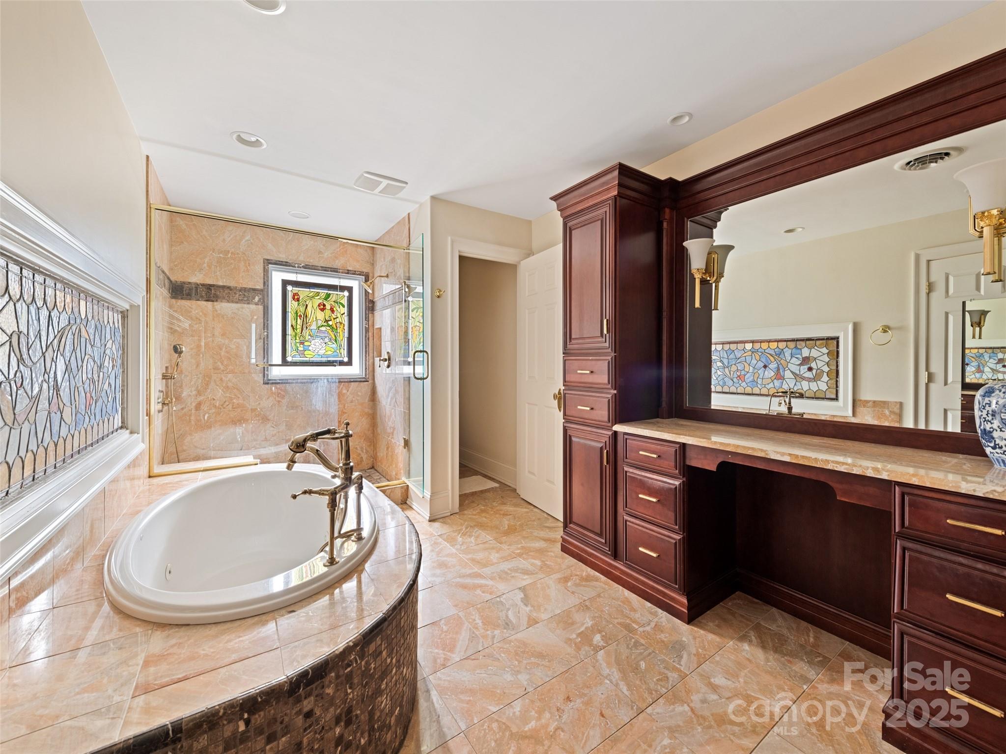 21 Riverbend Street Canton, NC 28716 - Photo 39 of 47 a spacious bathroom with a tub sink and mirror