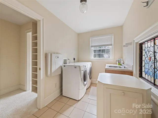 a view of a hallway with windows