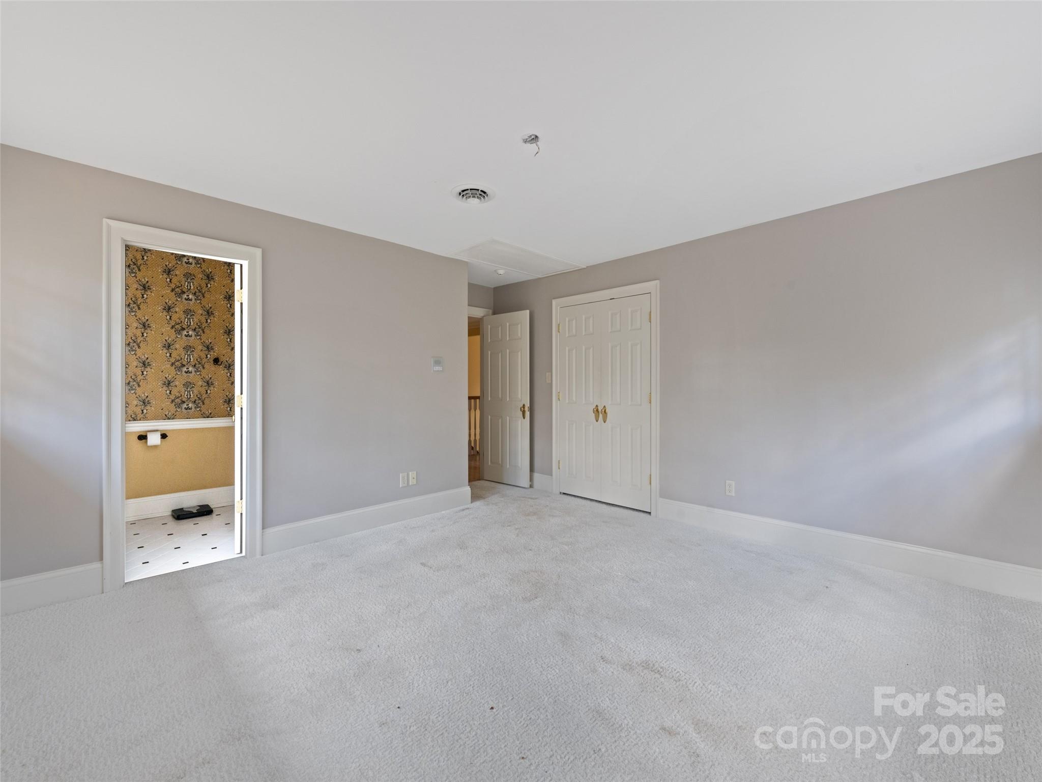 21 Riverbend Street Canton, NC 28716 - Photo 43 of 47 an empty room with windows and closet
