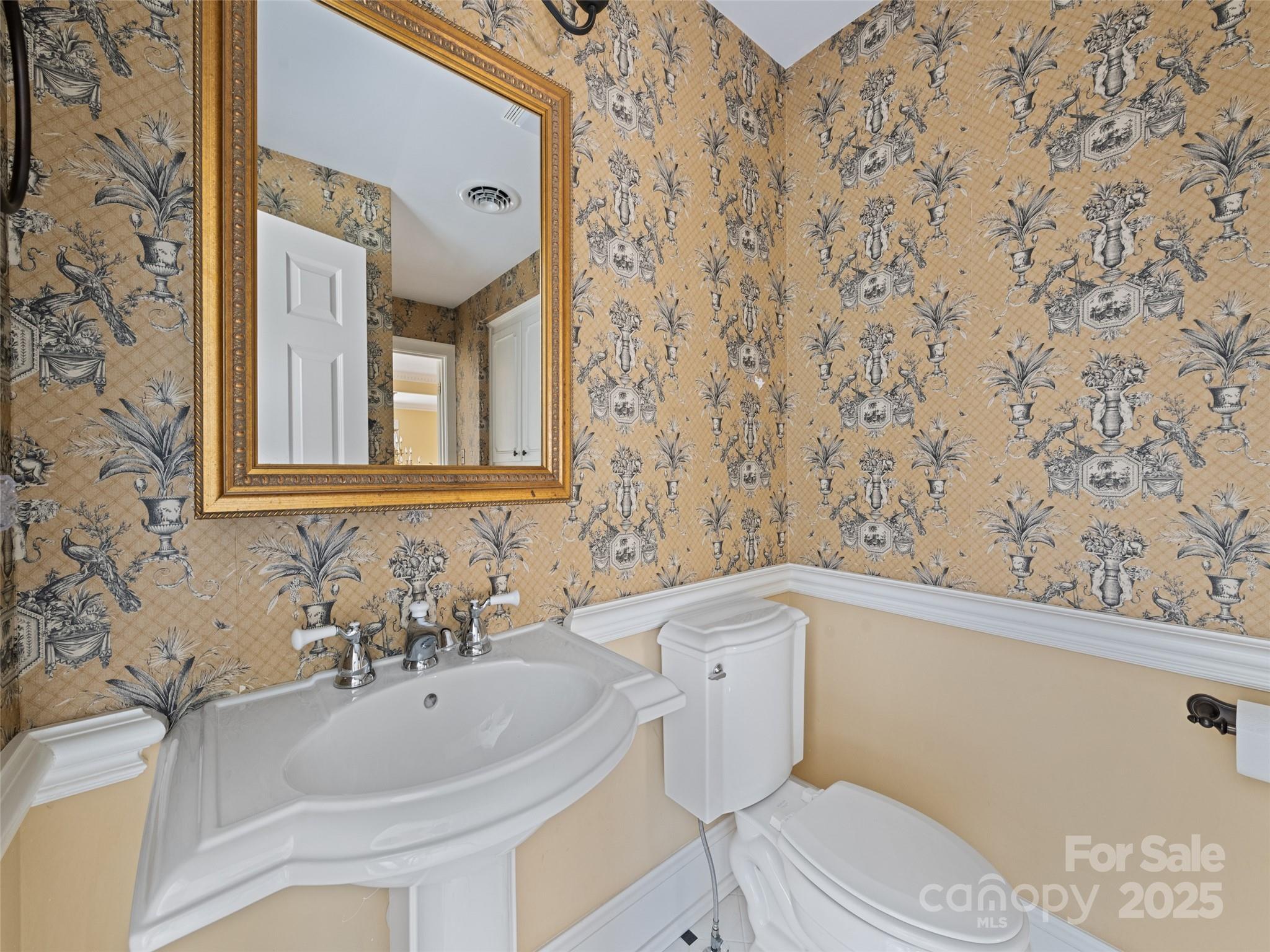 21 Riverbend Street Canton, NC 28716 - Photo 44 of 47 a bathroom with a sink and a mirror