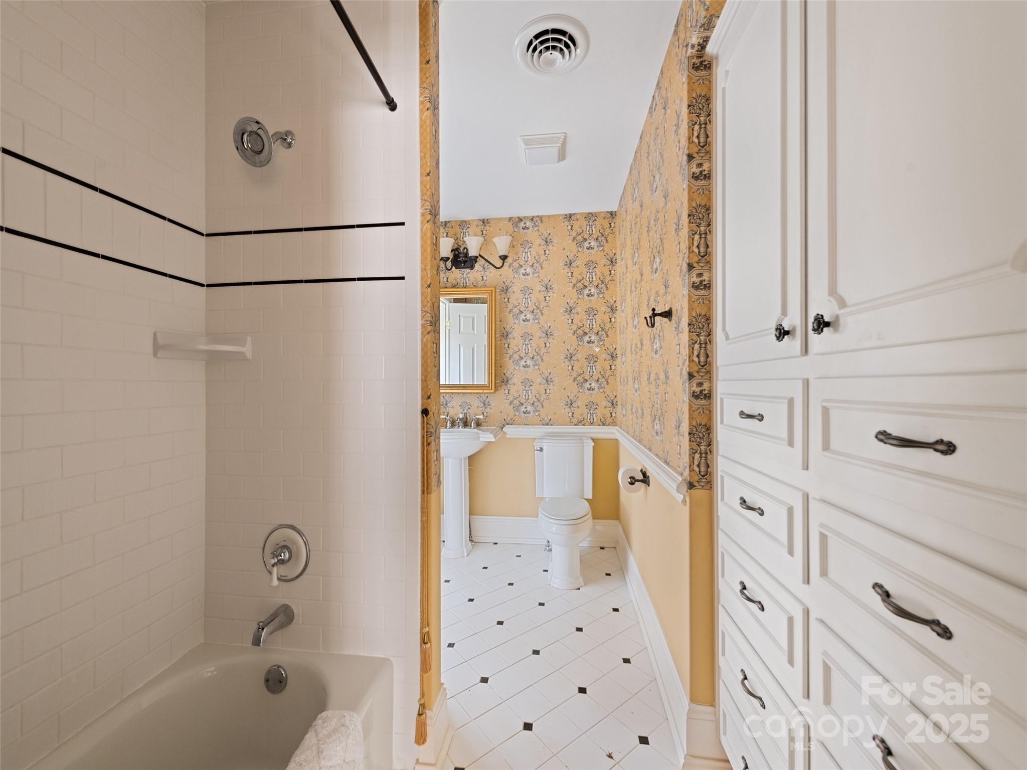 21 Riverbend Street Canton, NC 28716 - Photo 45 of 47 a bathroom with a shower and a tub