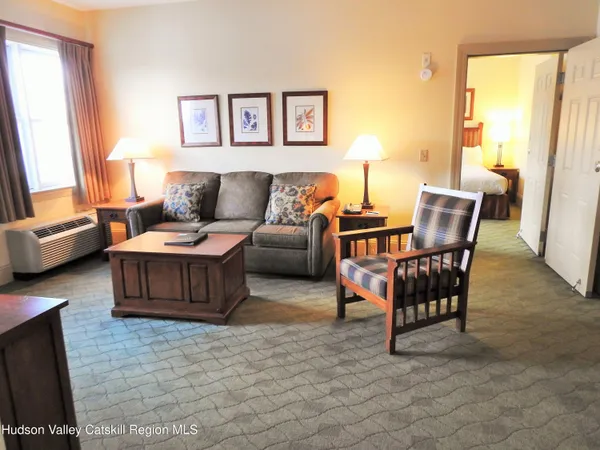 a living room with furniture and a couch