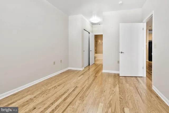 a view of a bedroom from a hallway