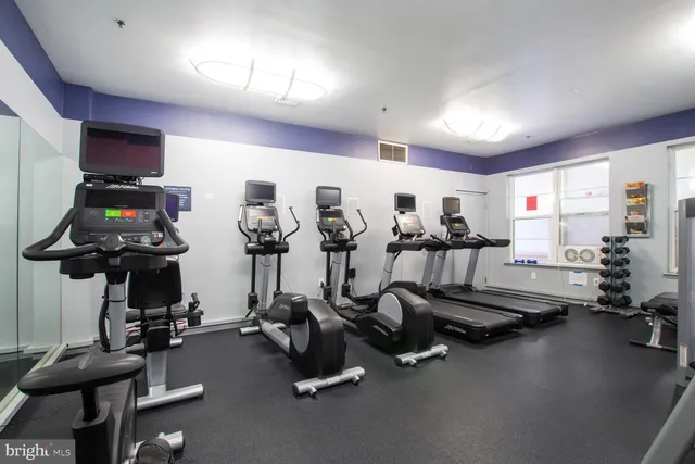 a view of a room with gym equipment