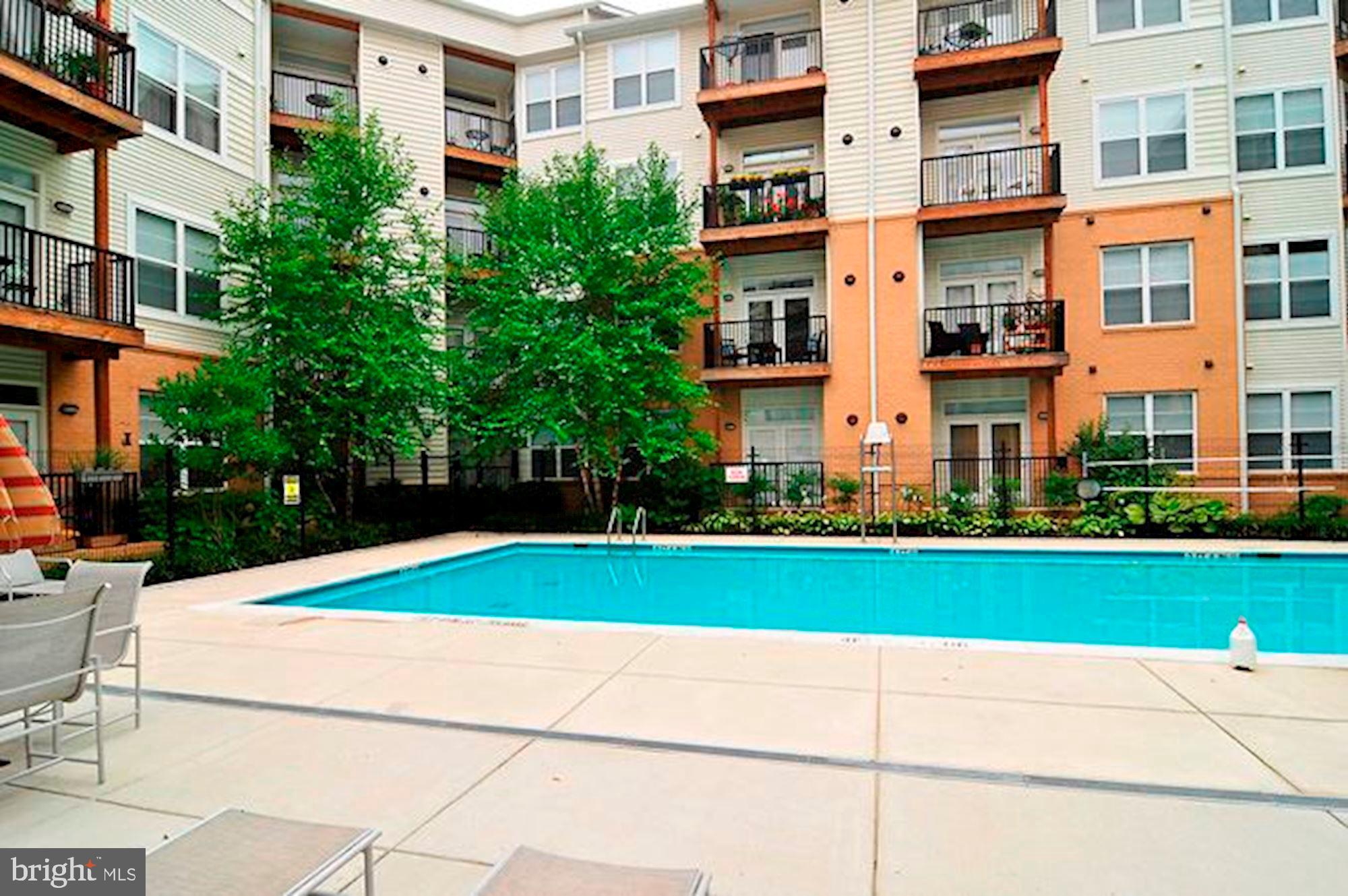 1201 East-West Highway, Unit 331 Silver Spring, MD 20910 - Photo 30 of 34 a house view with a garden space