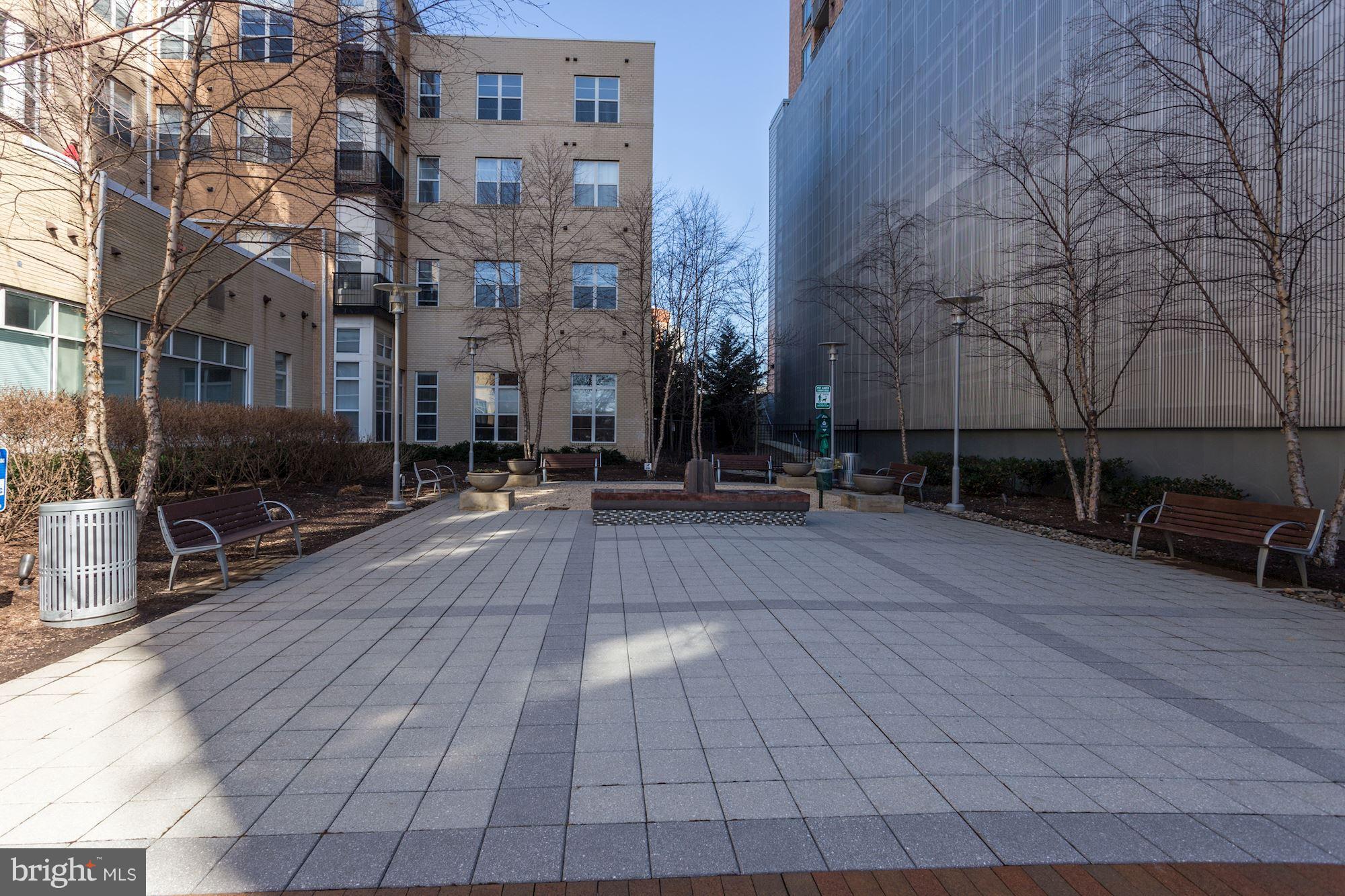 1201 East-West Highway, Unit 331 Silver Spring, MD 20910 - Photo 31 of 34 a view of outdoor space with seating area