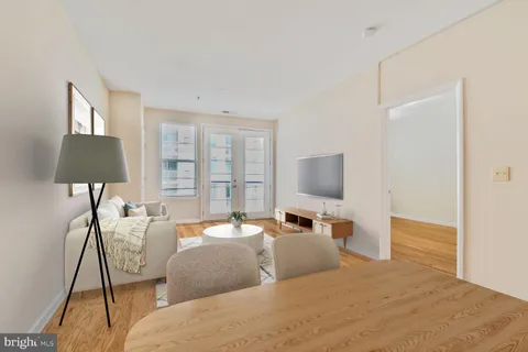 a bedroom with a bed and a lamp