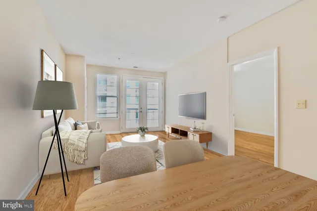 a bedroom with a bed and a lamp