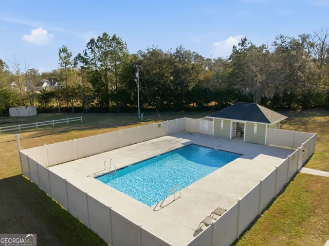 a view of a house with a swimming pool