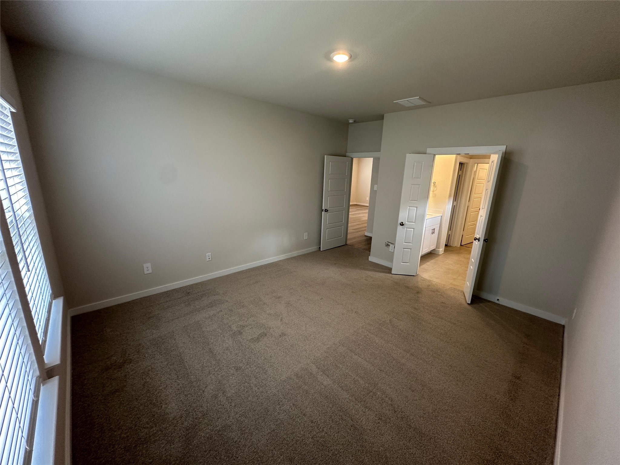1908 Velvet Oak Lane Conroe, TX 77304 - Photo 11 of 16 an empty room with windows