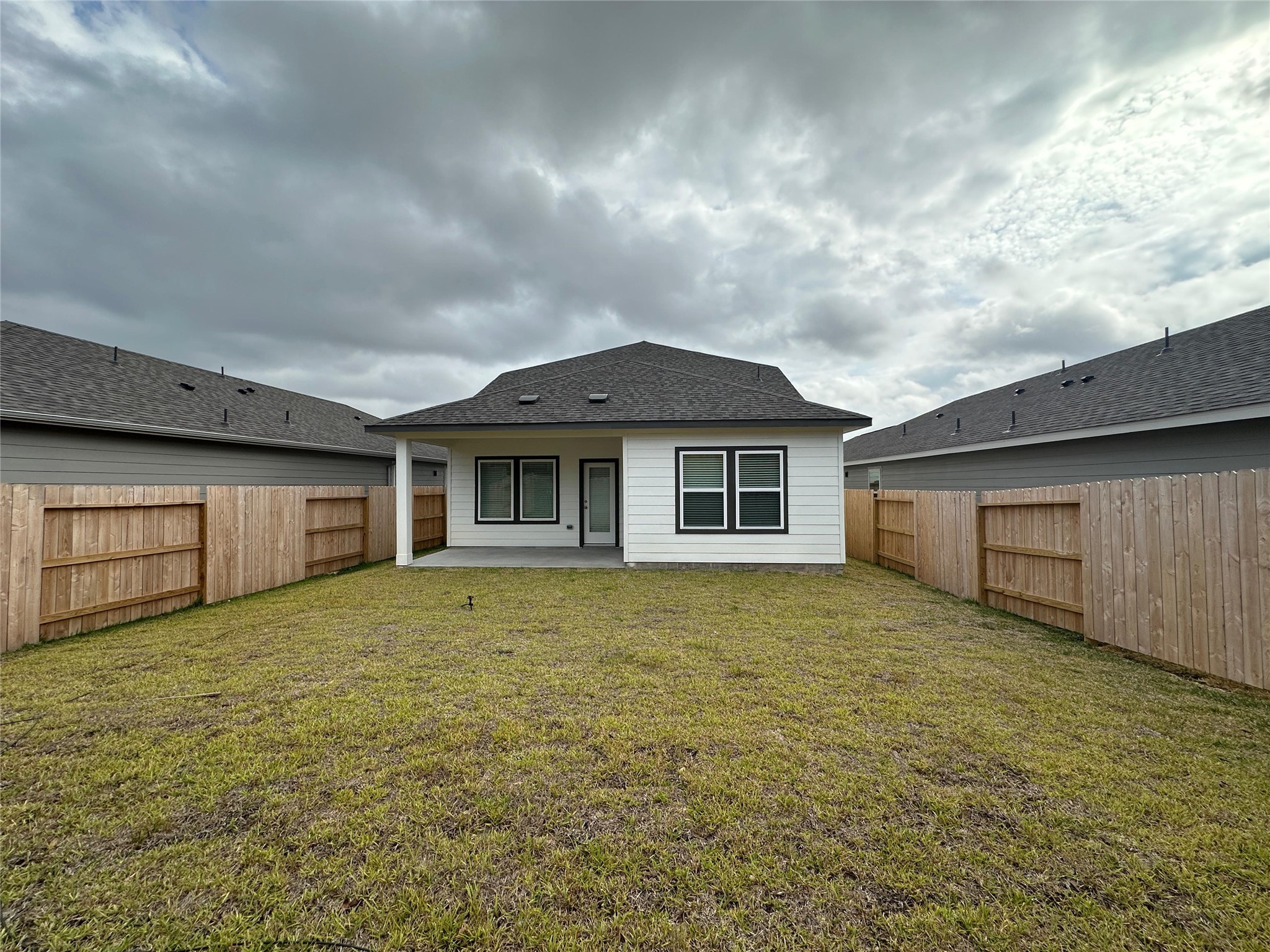 1908 Velvet Oak Lane Conroe, TX 77304 - Photo 9 of 16 a view of a house with a yard