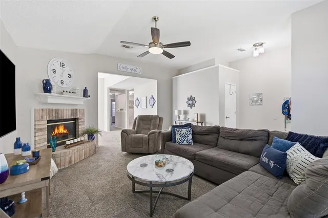 a view of livingroom with furniture and windows