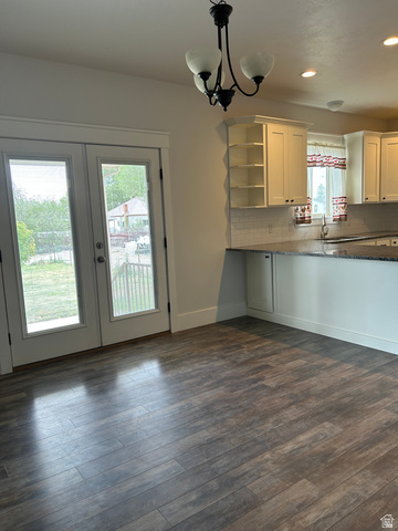 175 North 100th West Centerfield, UT 84622 - Photo 10 of 32 Dining area featuring wood-finish flooring and French doors