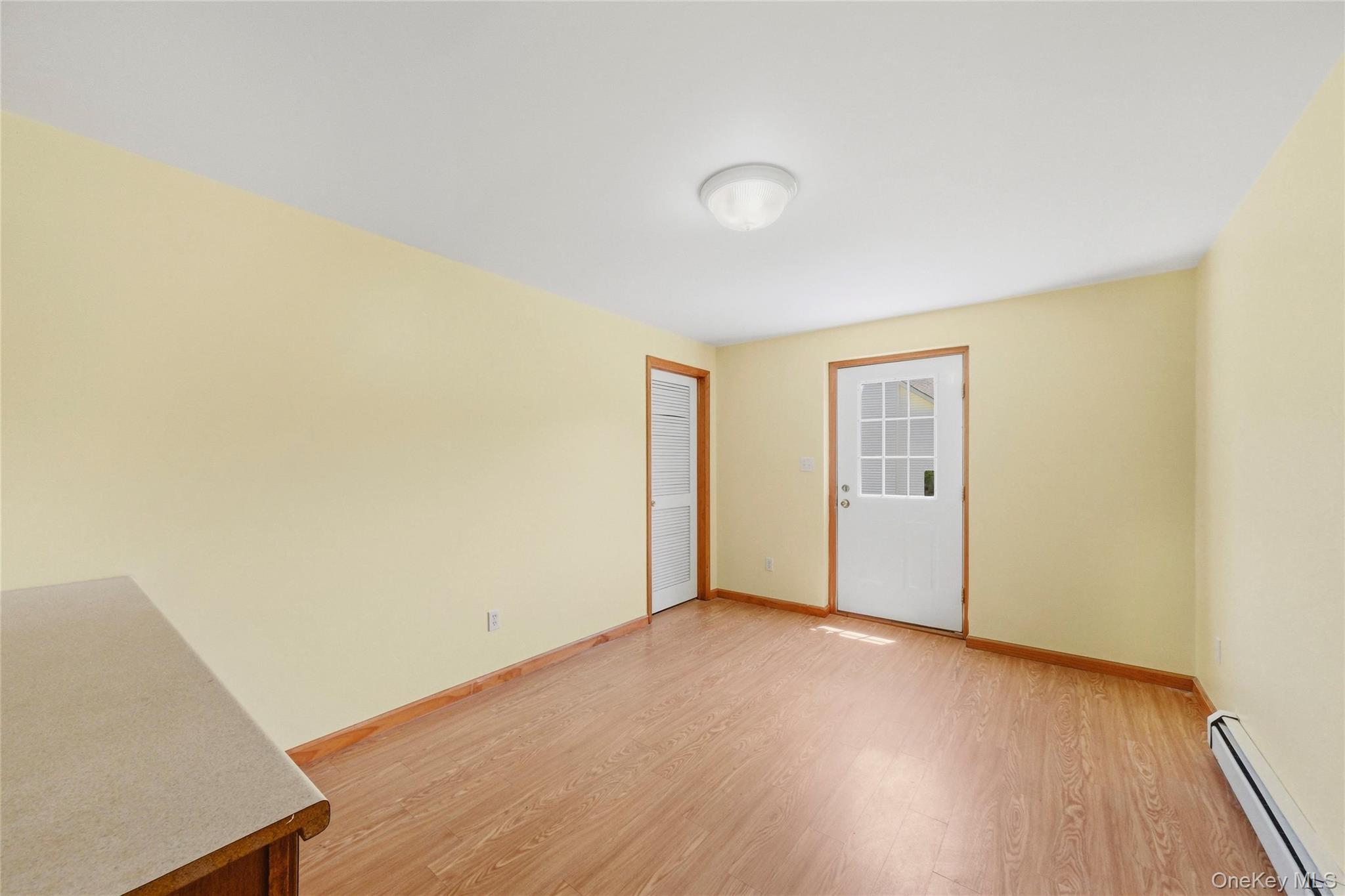 5 Horton Road Washingtonville, NY 10992 - Photo 36 of 42 an empty room with wooden floor