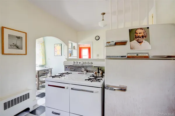 a bathroom with a sink mirror and vanity