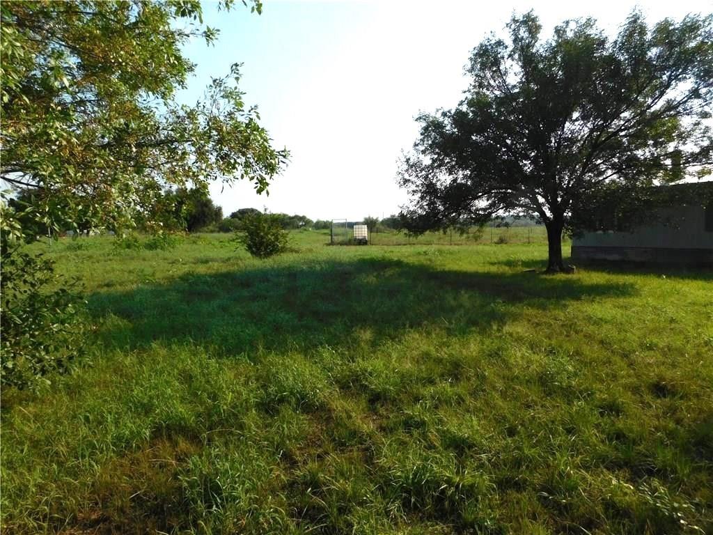 105 Apache Road Brownwood, TX 76801 - Photo 1 of 24 a view of field with trees in the background