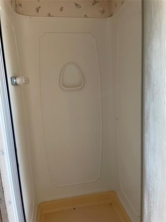 105 Apache Road Brownwood, TX 76801 - Photo 12 of 24 a bathroom with a shower