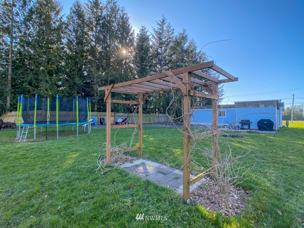1104 Nooksack Road Nooksack, WA 98276 - Photo 29 of 33 a view of a house with a backyard