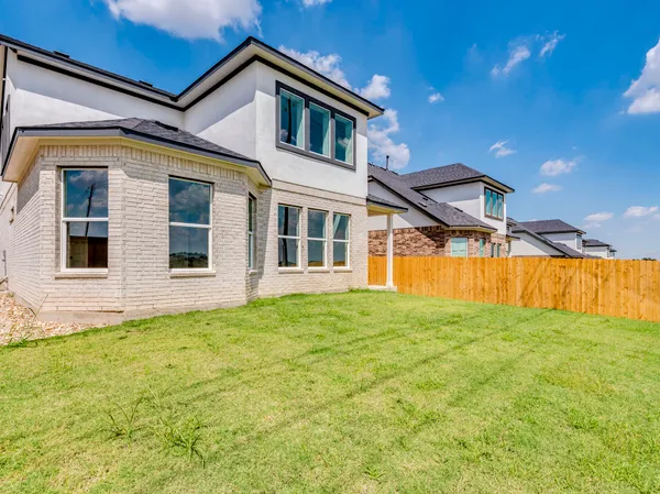 a house view with a garden space