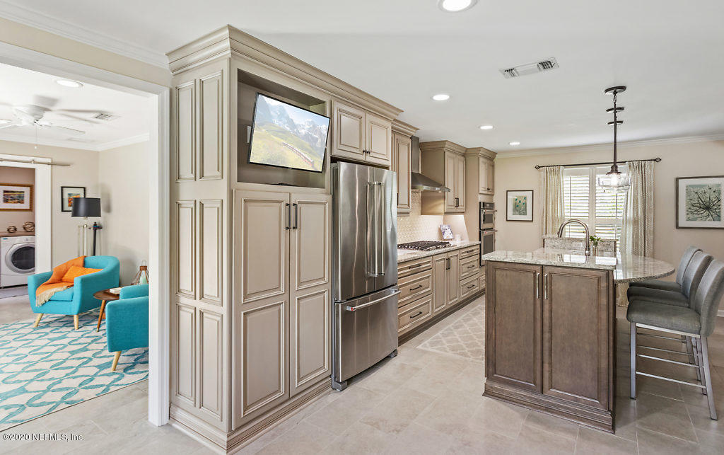 8161 Hunters Grove Road Jacksonville, FL 32256 - Photo 16 of 68 kitchen to sunroom