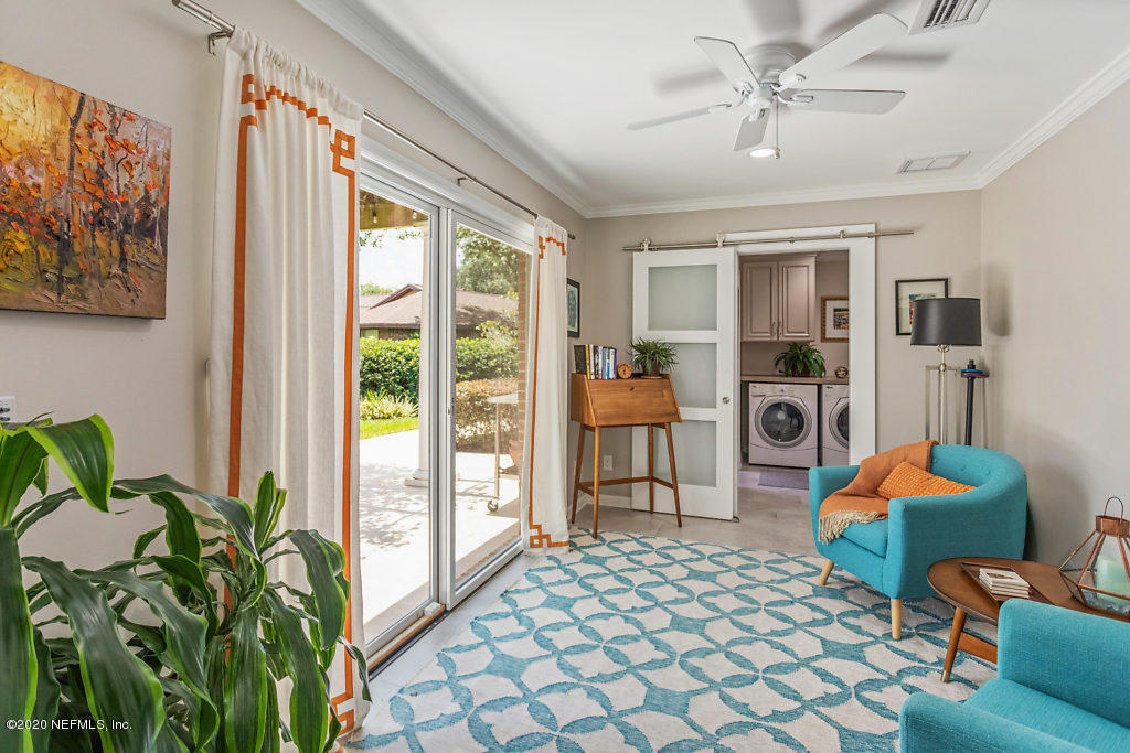 8161 Hunters Grove Road Jacksonville, FL 32256 - Photo 36 of 68 sunroom to laundry