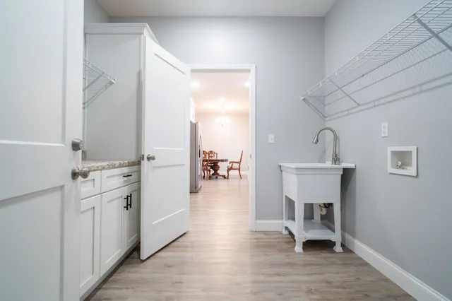 a bathroom with a sink and mirror