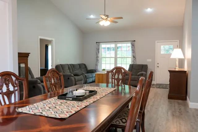 a kitchen with a sink stove and refrigerator
