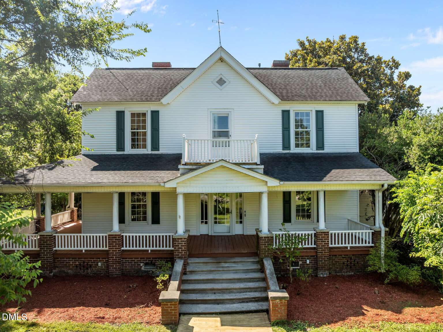 523 East Main Street Haw River, NC 27258 - Photo 2 of 25 a front view of a house with a yard