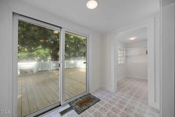 a view of an empty room and window