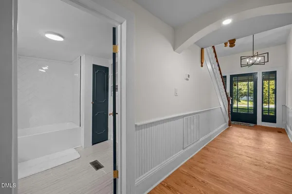 a view of a hallway with windows