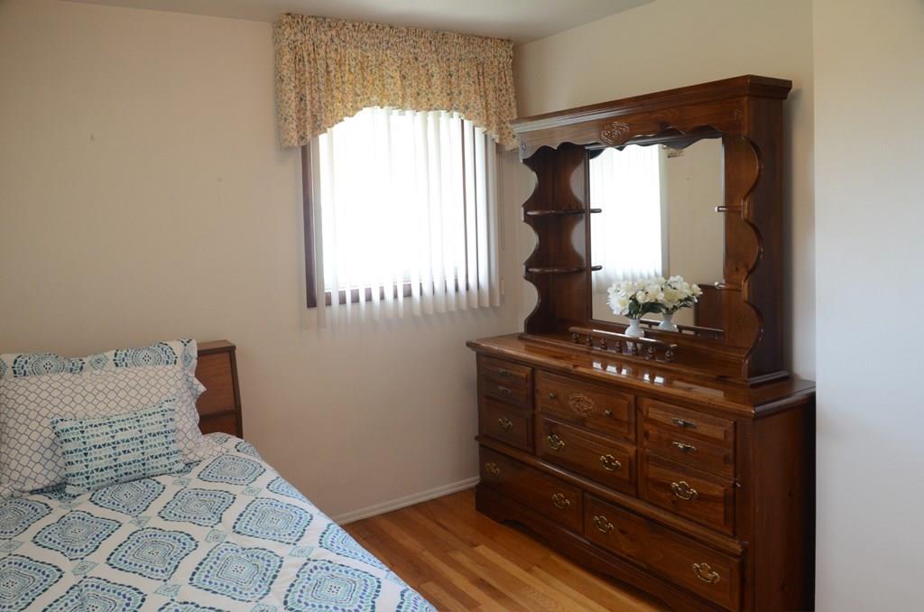 468 Lindsay Road Carnegie, PA 15106 - Photo 12 of 21 Bedroom number 2 located in back corner of the home. This overlooks side and back yard of the home.