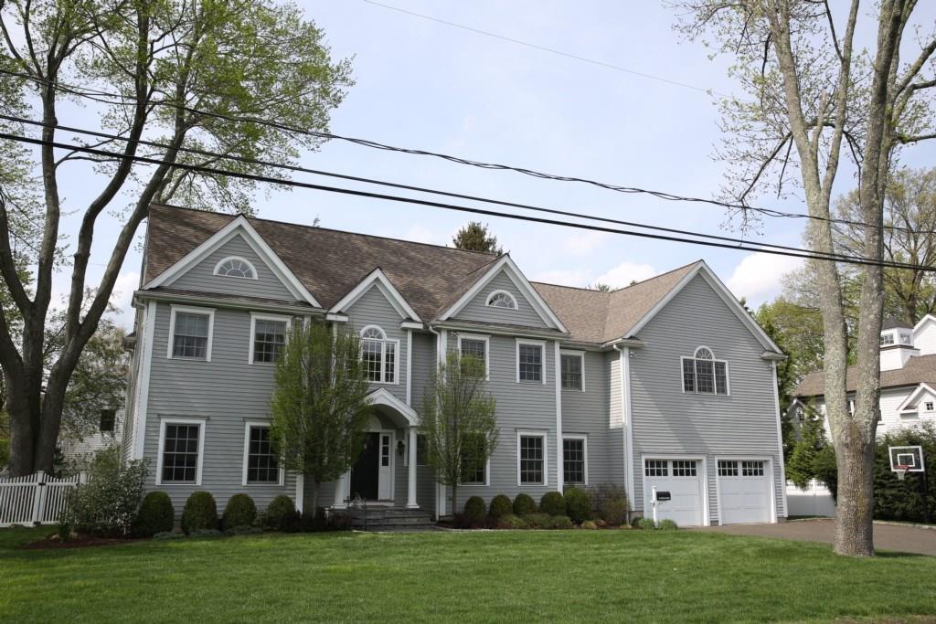 29 Douglas Road New Canaan, CT 06840 - Photo 1 of 1 front view of a house with a yard