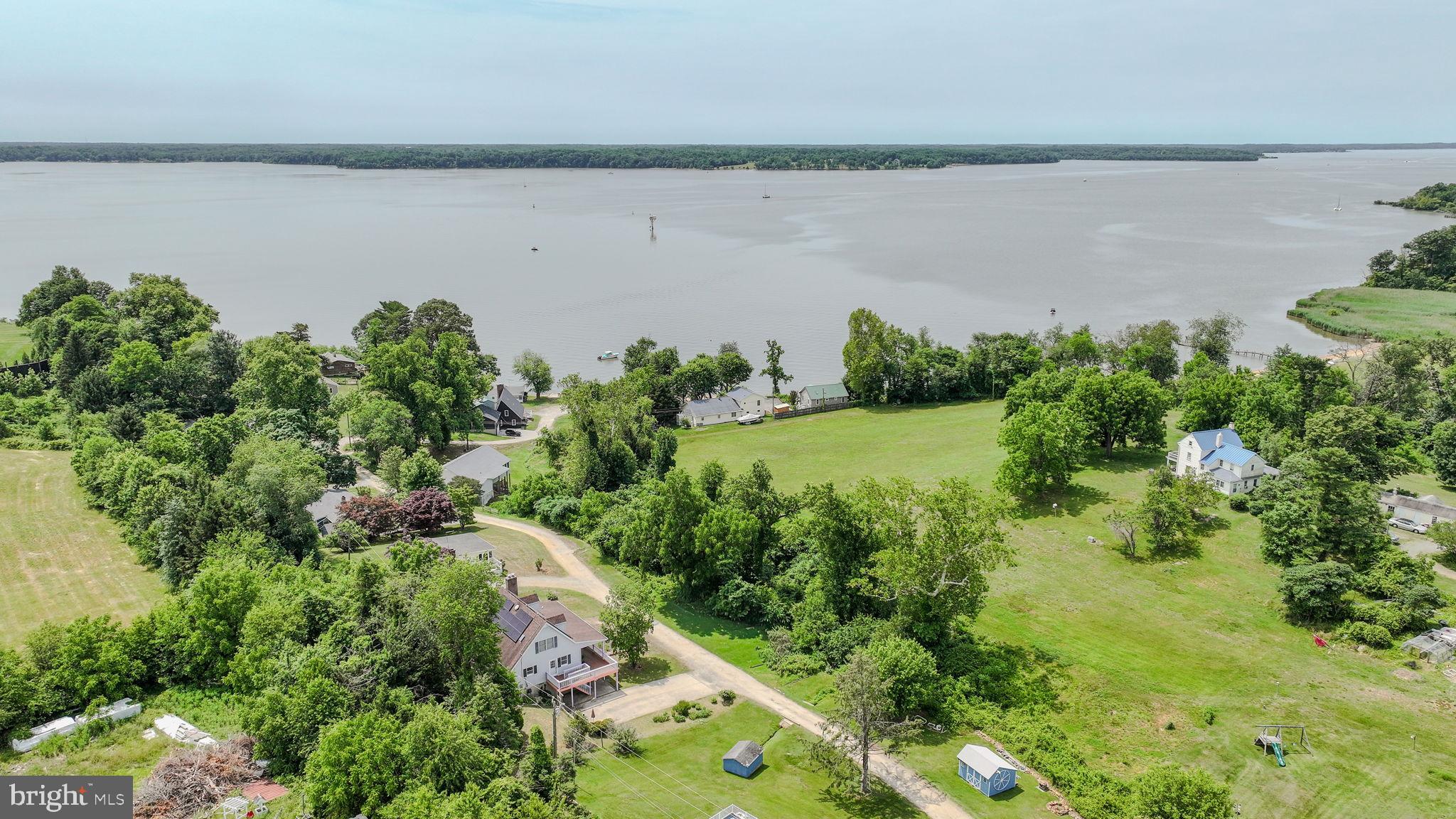 210 Elk View Road North East, MD 21901 - Photo 59 of 64 a view of a lake with a yard