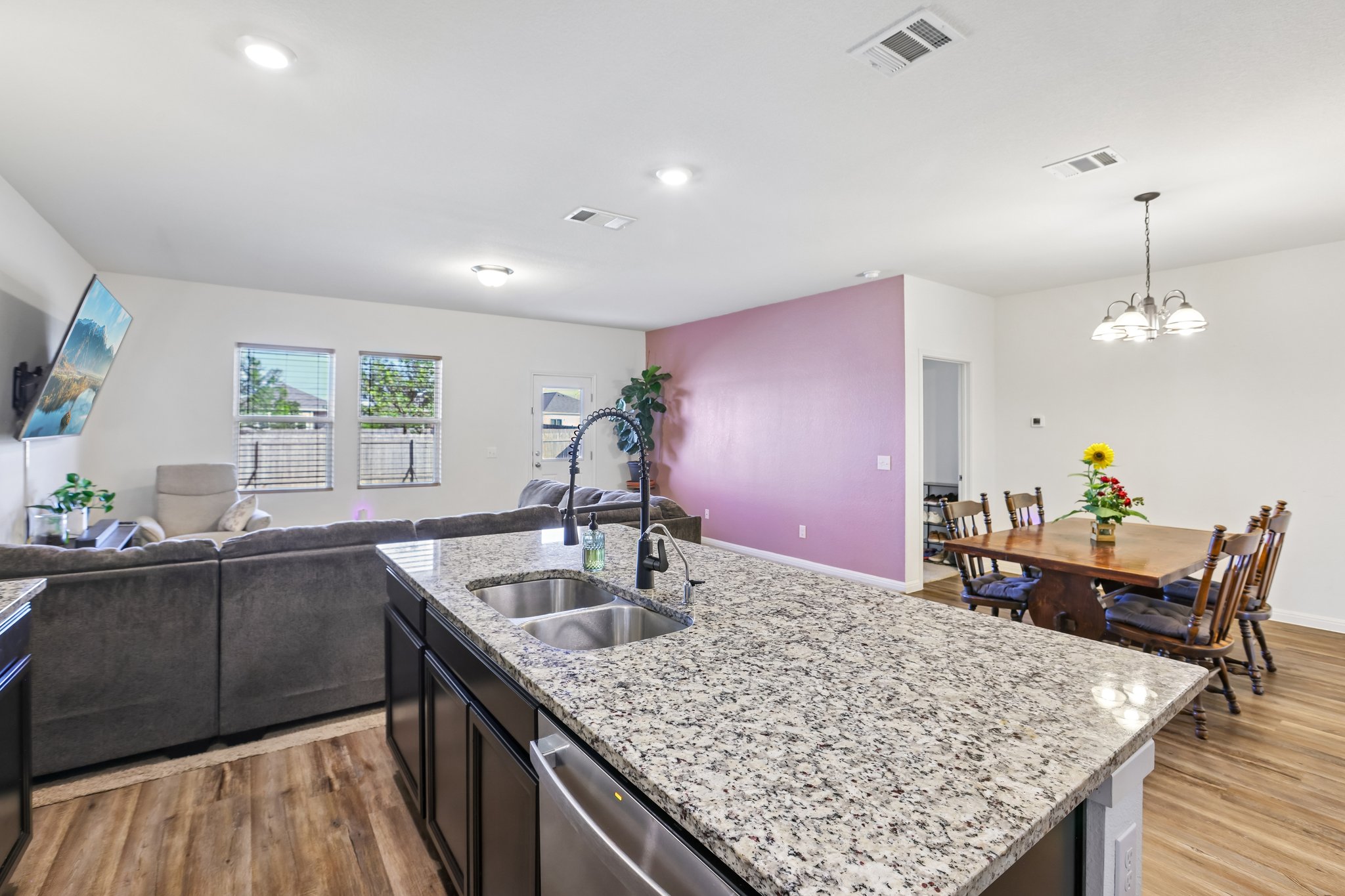 19105 Mike Mansfield Road Manor, TX 78653 - Photo 7 of 28 a kitchen with sink and cabinetry