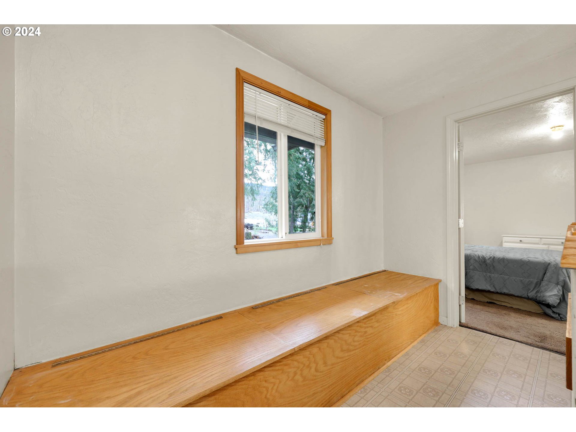 590 South 71st Street Springfield, OR 97478 - Photo 21 of 44 a bedroom with a bed and a window