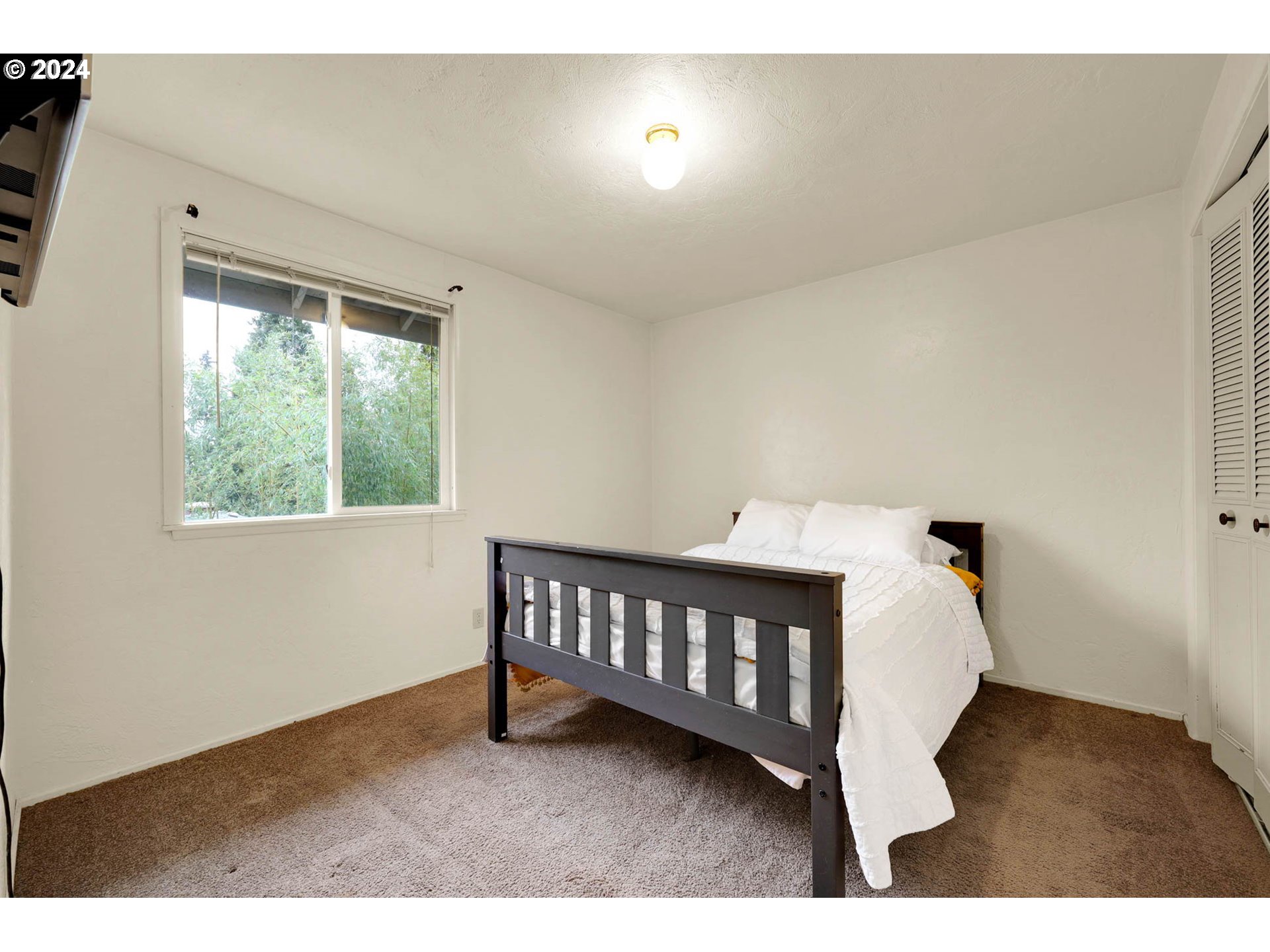 590 South 71st Street Springfield, OR 97478 - Photo 25 of 44 a view of a bedroom with wooden floor