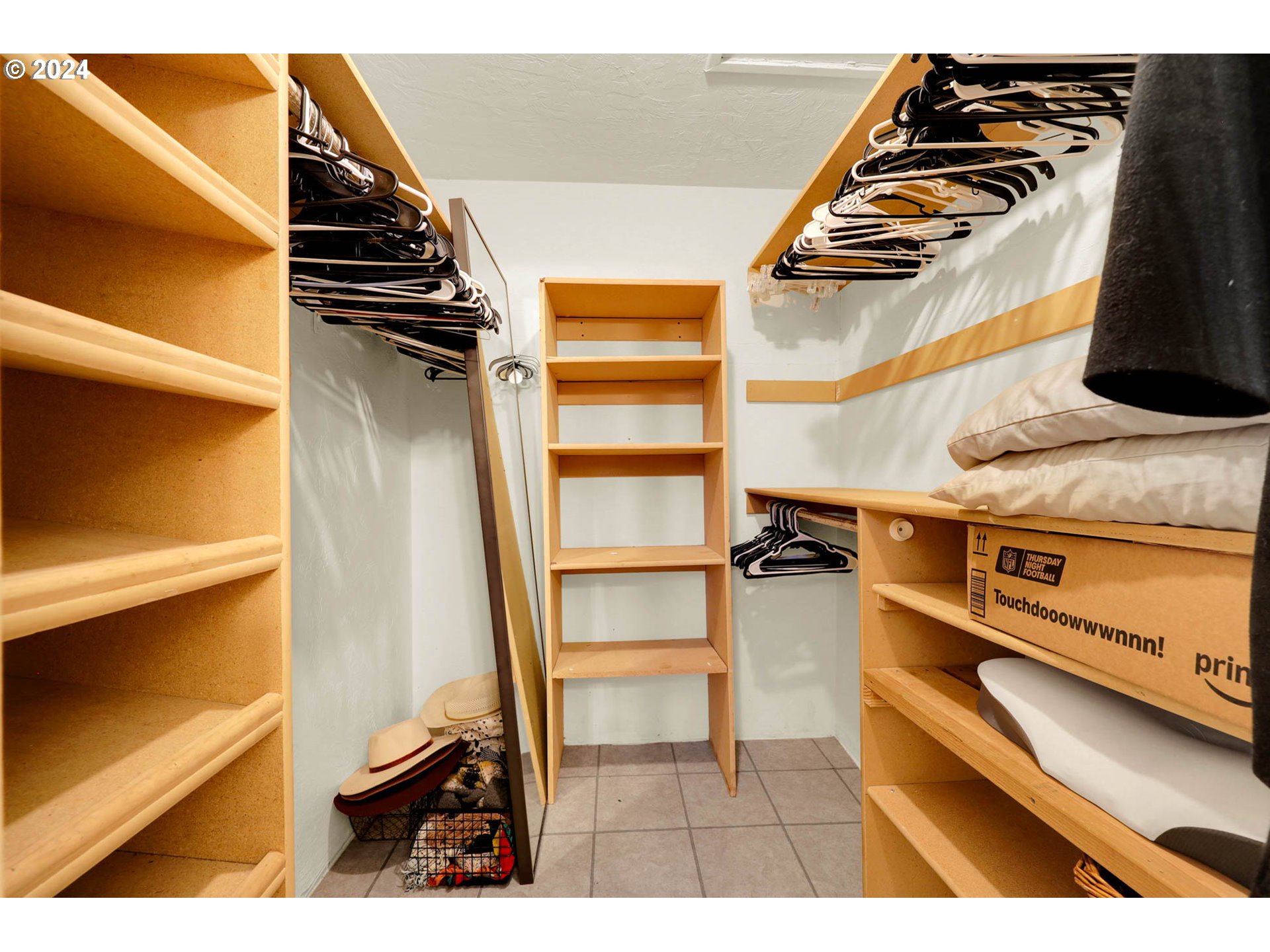 590 South 71st Street Springfield, OR 97478 - Photo 36 of 44 a view of walk in closet with clothes and shoes